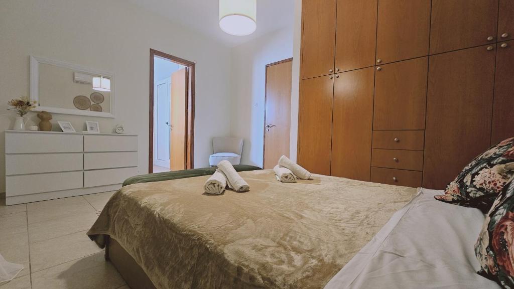 Postel nebo postele na pokoji v ubytování STAY Tranquility Cove