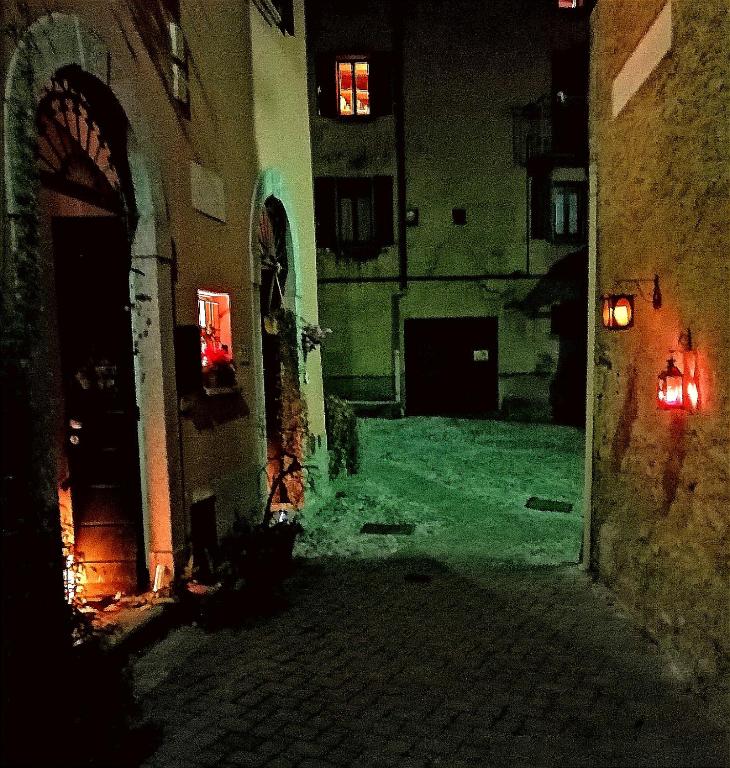 an empty alleyway in an old building at night at B&B Le Fate Del Lago in Lierna