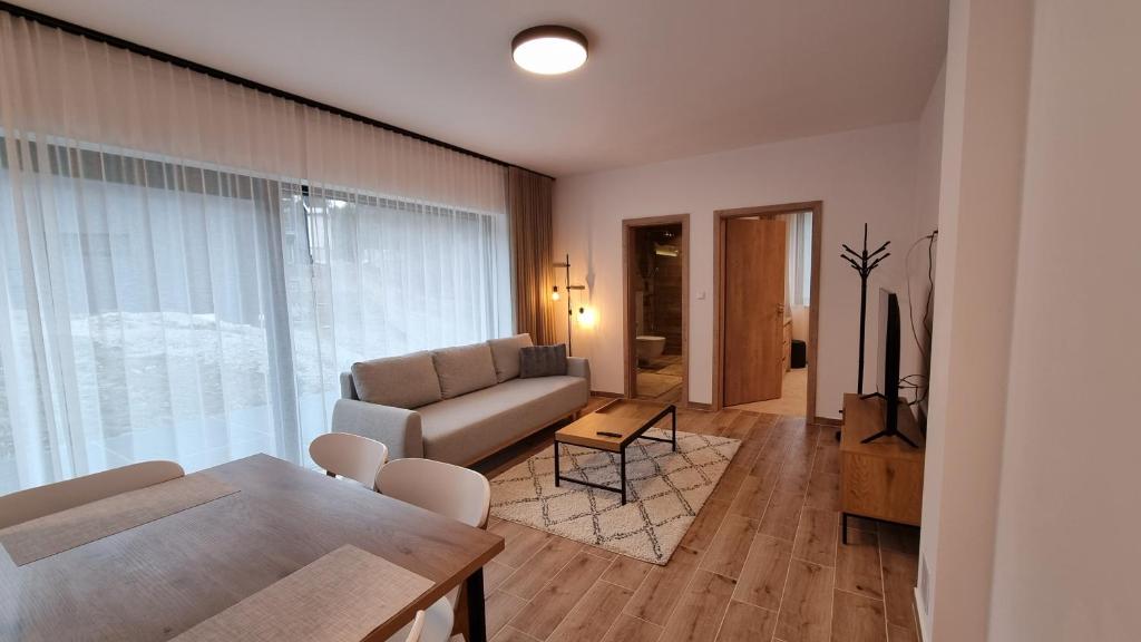 Posezení v ubytování Chalets Hrabovo