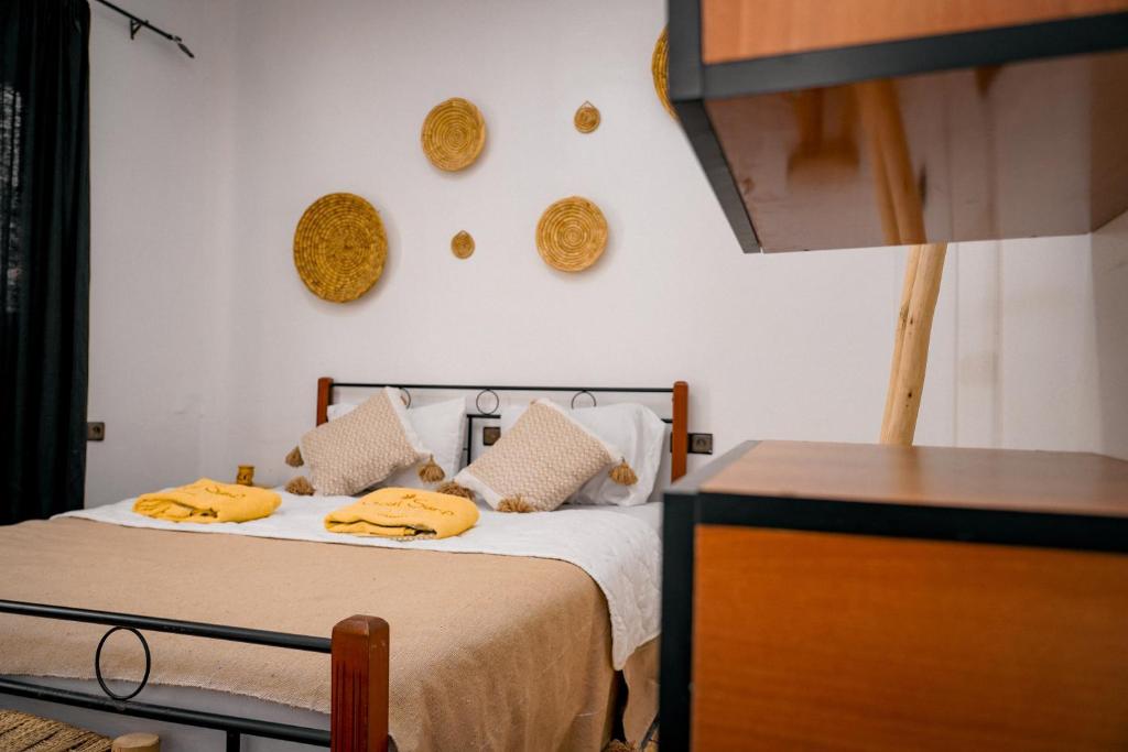 Postel nebo postele na pokoji v ubytování Soul Surf House Anza