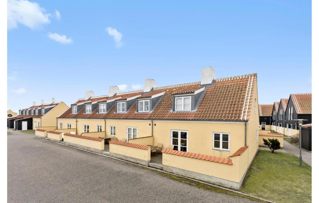 a row of houses on the side of a street at Gorgeous Apartment In Skagen With Sauna in Skagen