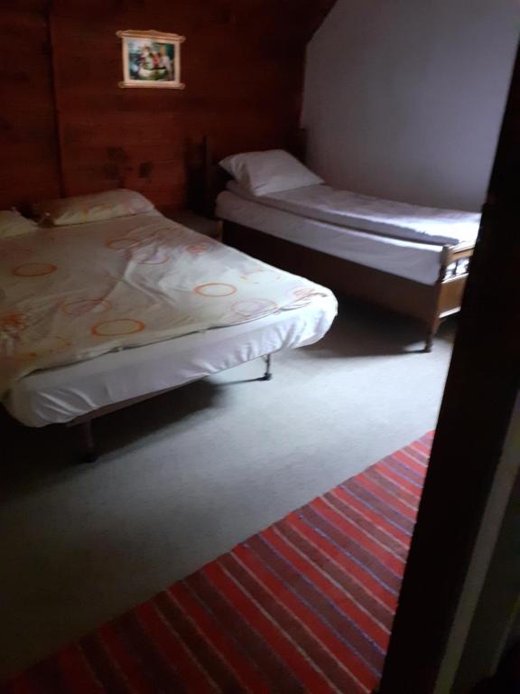 Letto o letti in una camera di Cabana Valea Stanciului