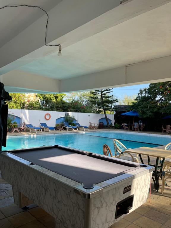 Bazén v ubytování Sunrise Apartments-Nyali nebo v jeho okolí