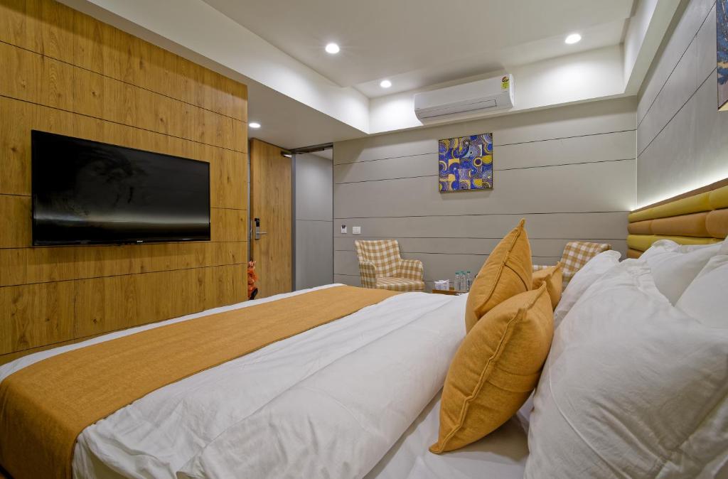 TV a/nebo společenská místnost v ubytování Hotel Lake Point