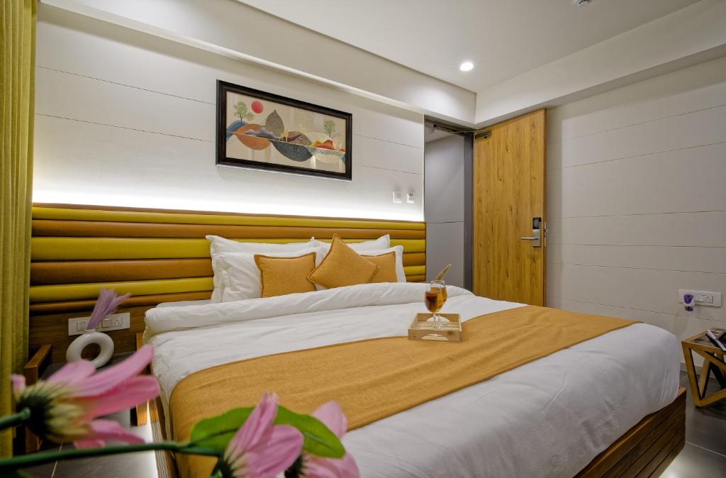 Postel nebo postele na pokoji v ubytování Hotel Lake Point