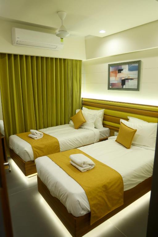 Postel nebo postele na pokoji v ubytování Hotel Lake Point