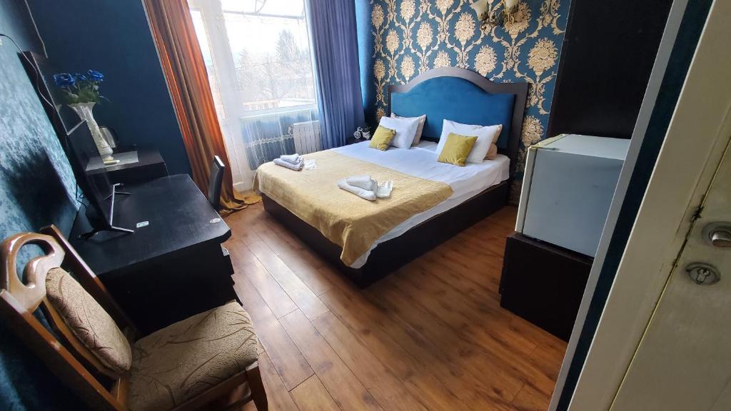 Postel nebo postele na pokoji v ubytování Hotel Antalia