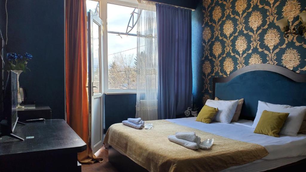 Postel nebo postele na pokoji v ubytování Hotel Antalia