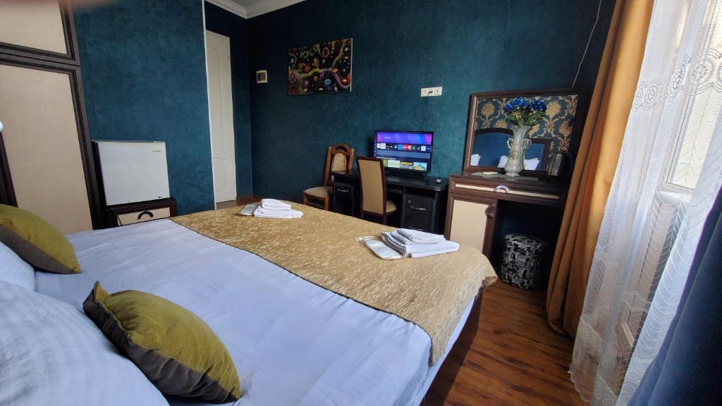 Postel nebo postele na pokoji v ubytování Hotel Antalia