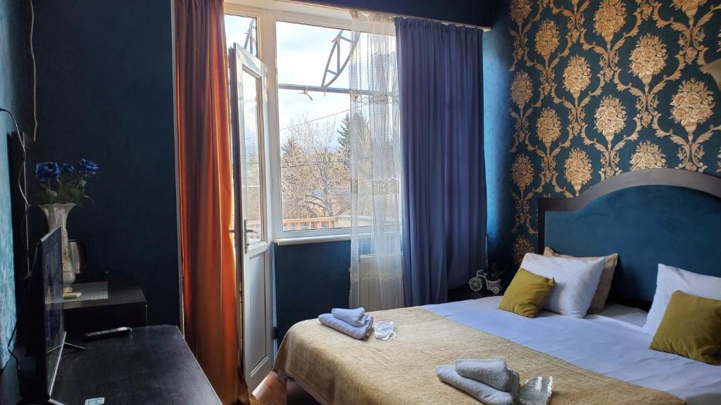 Postel nebo postele na pokoji v ubytování Hotel Antalia