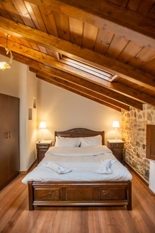 Postel nebo postele na pokoji v ubytování Guesthouse Lousios