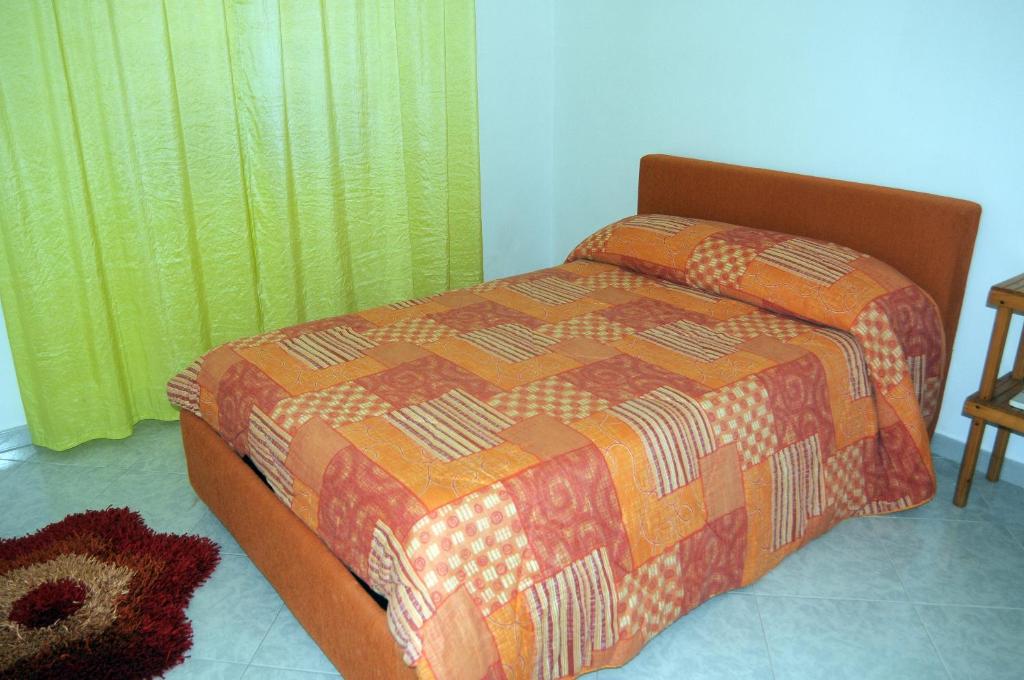 Posteľ alebo postele v izbe v ubytovaní Home's Vita