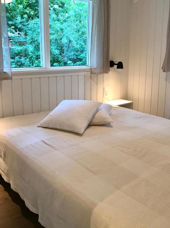 Postel nebo postele na pokoji v ubytování Nordic Relax House - Stonehouse