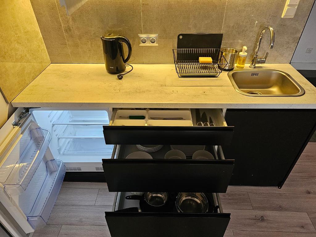 Kuchyňa alebo kuchynka v ubytovaní Willa Kolor Pokoje Apartamenty Restauracja