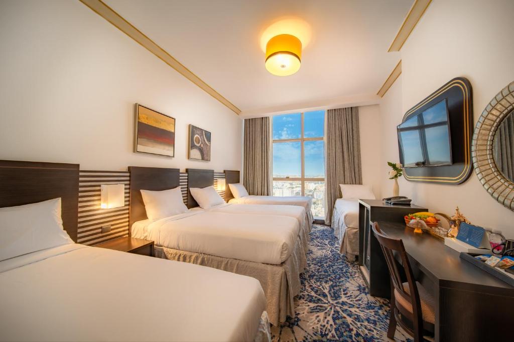 تلذذ بالرفاهية: أفندق أبراج الكسوة مكة بانتظارك - استمتع بالمأكولات اللذيذة في المطاعم الراقية