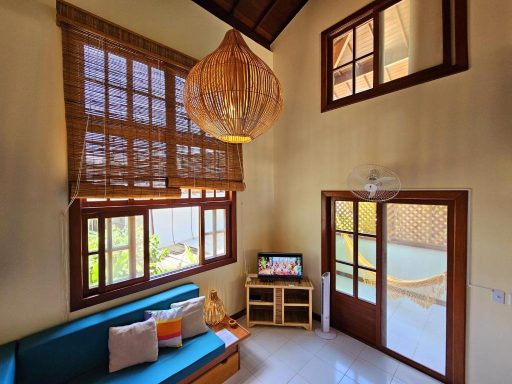 TV a/nebo společenská místnost v ubytování Maná da Concha Apartamento