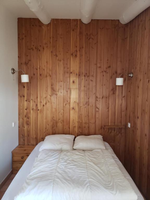 Postel nebo postele na pokoji v ubytování Auberge Les Myrtilles