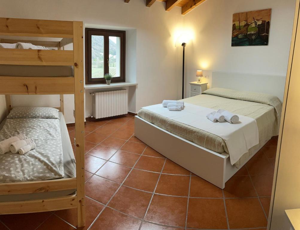 En eller flere senger på et rom på Corte Vicolo Ciodo