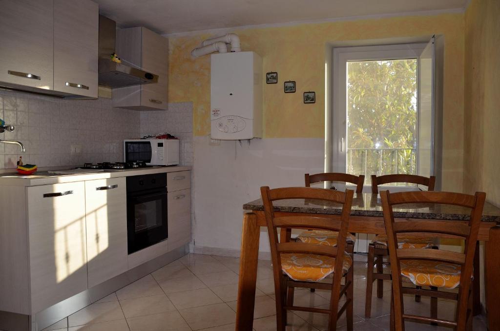 Kuchyň nebo kuchyňský kout v ubytování Luce Stellata