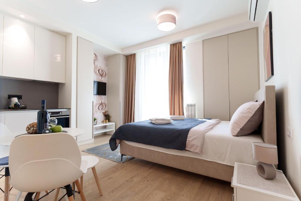 Postel nebo postele na pokoji v ubytování Capital Lux Apartments-Belgrade Waterfront