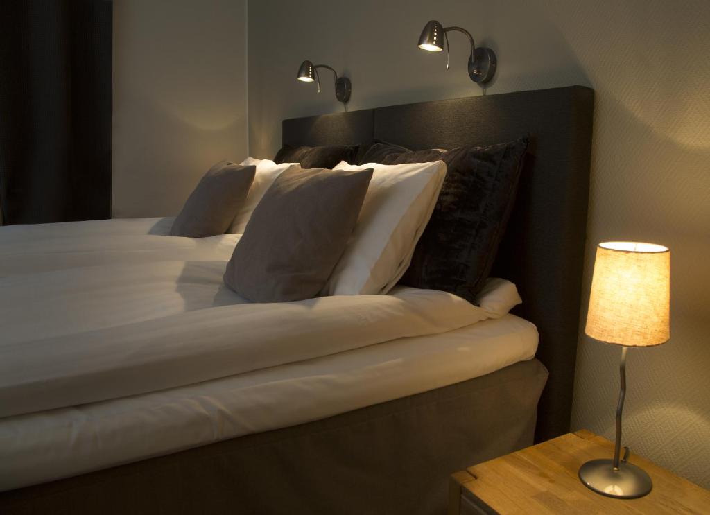 Postel nebo postele na pokoji v ubytování Park Hotell