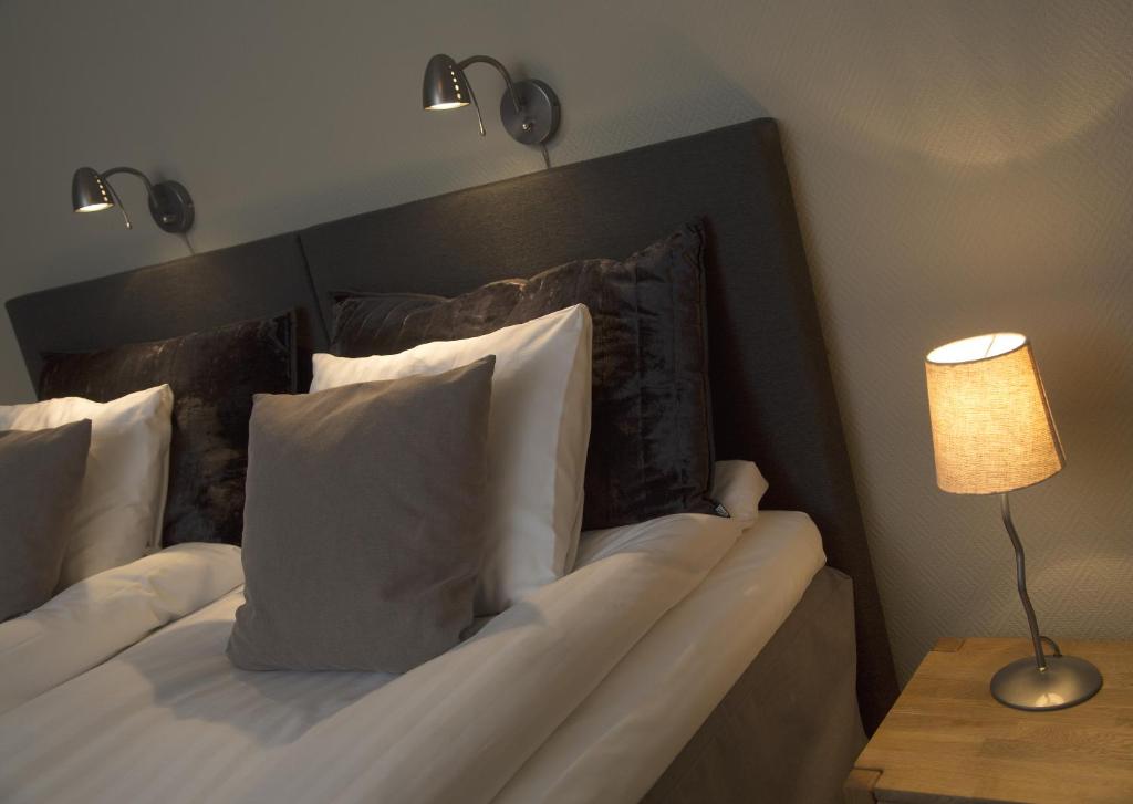 Postel nebo postele na pokoji v ubytování Park Hotell