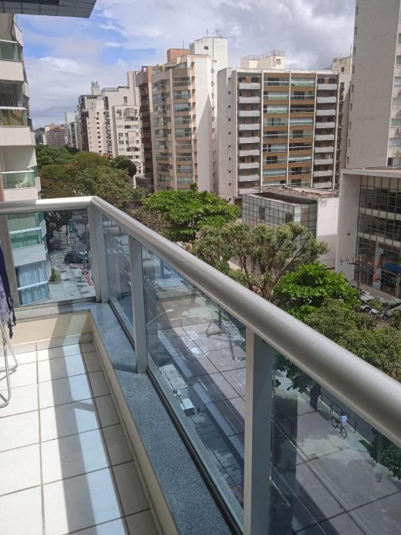 a balcony with a view of a city at Apart Quartier Latin in Vitória