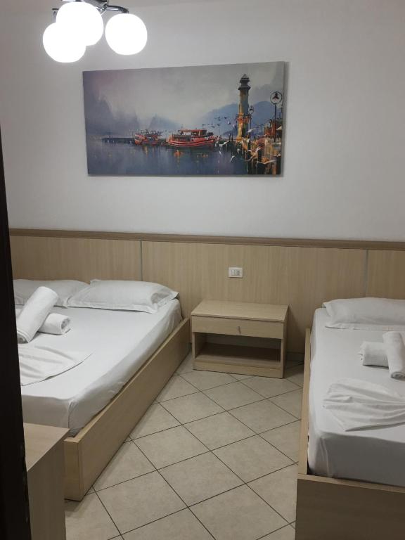 Postel nebo postele na pokoji v ubytování Apart-Hotel Alvi