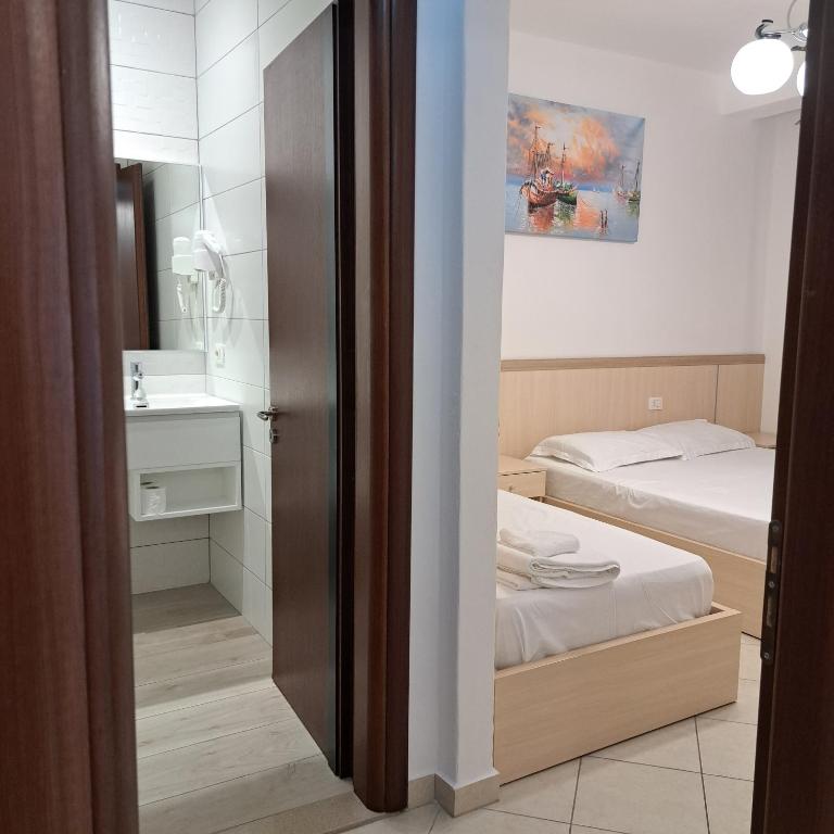 Koupelna v ubytování Apart-Hotel Alvi