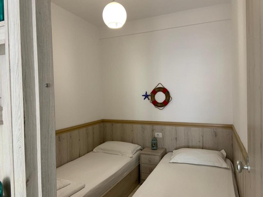 Postel nebo postele na pokoji v ubytování Apart-Hotel Alvi