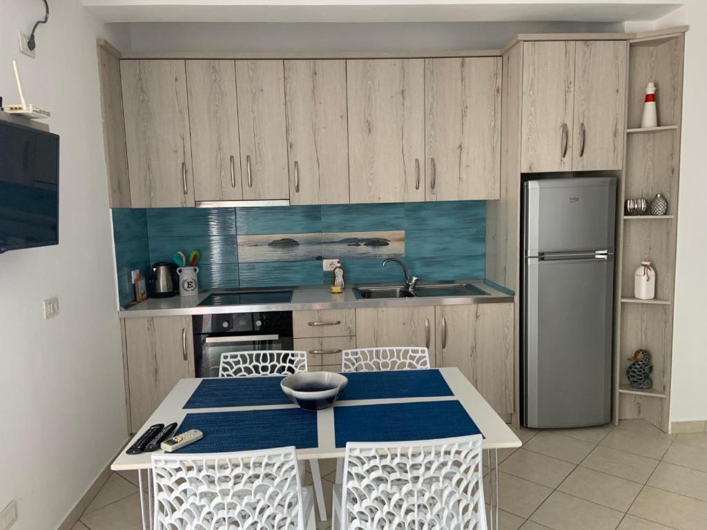 Kuchyň nebo kuchyňský kout v ubytování Apart-Hotel Alvi