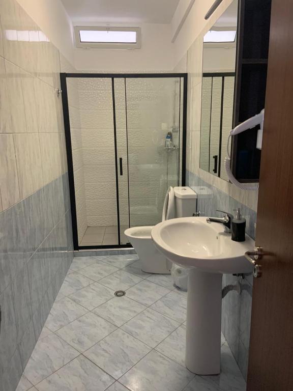 Koupelna v ubytování Apart-Hotel Alvi