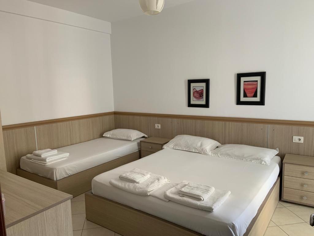 Postel nebo postele na pokoji v ubytování Apart-Hotel Alvi