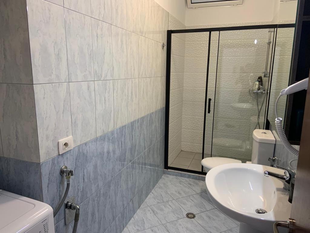 Koupelna v ubytování Apart-Hotel Alvi