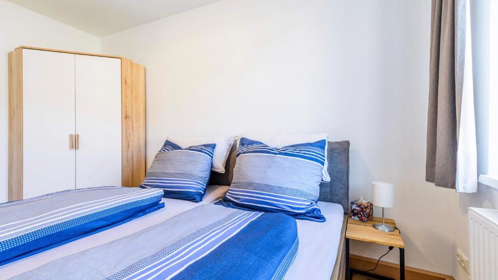 Postel nebo postele na pokoji v ubytování Traunkai Apartments Bad Ischl