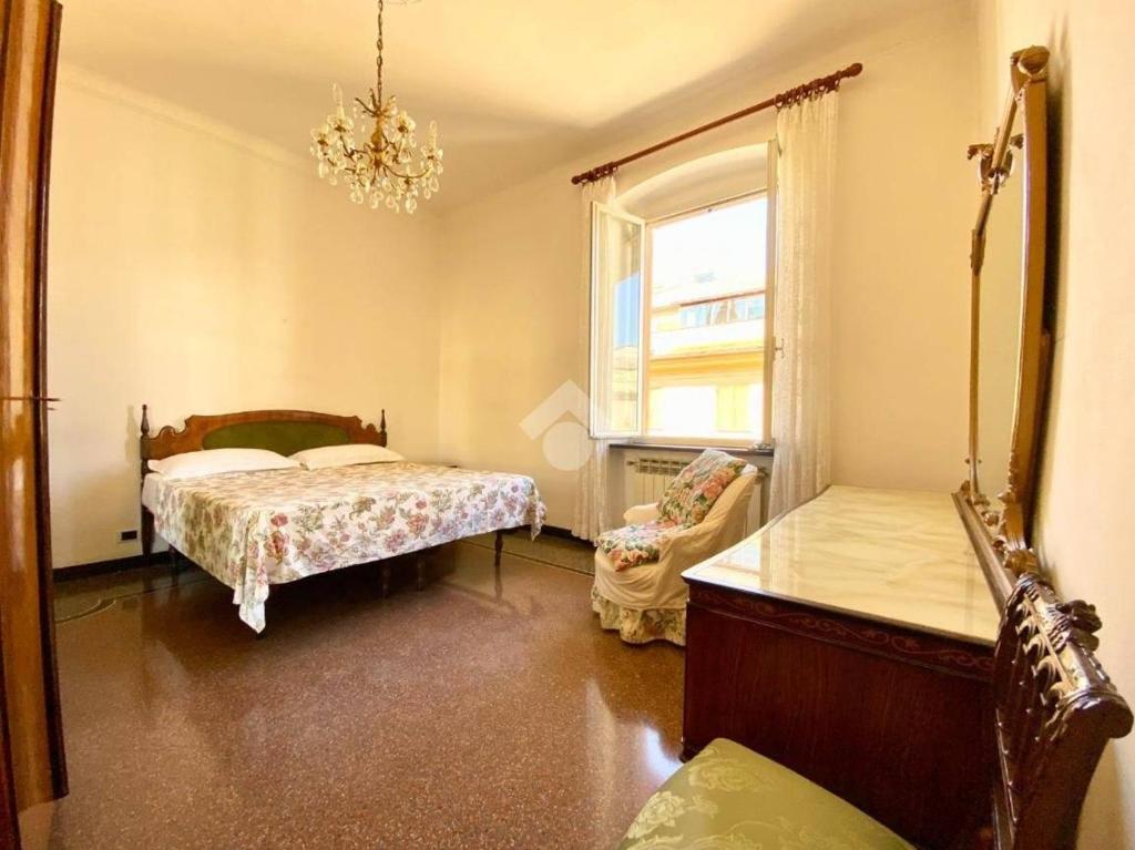 Ein Bett oder Betten in einem Zimmer der Unterkunft City Center Genova - 18