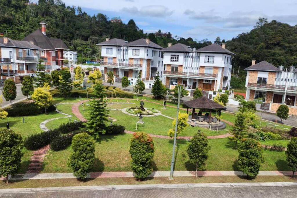 an aerial view of a park with houses at Zinnia Residence in Tanah Rata