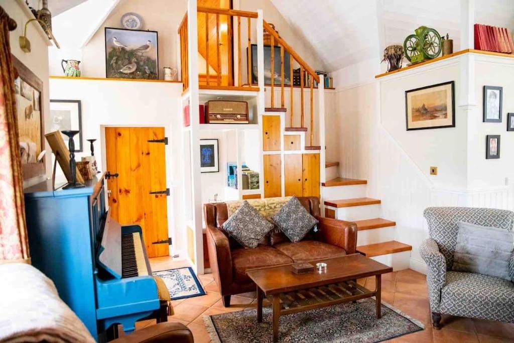 Posezení v ubytování Ghleann Éada Cottage