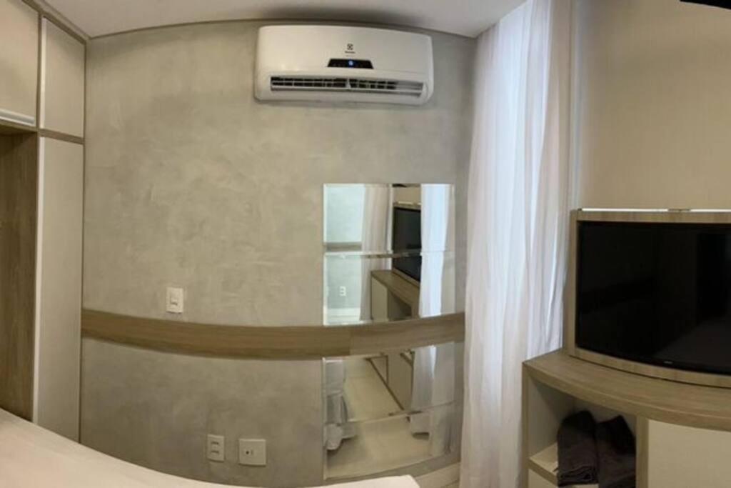 Televízia a/alebo spoločenská miestnosť v ubytovaní Flat que acomoda até 4 pessoas Boa Viagem-Recife