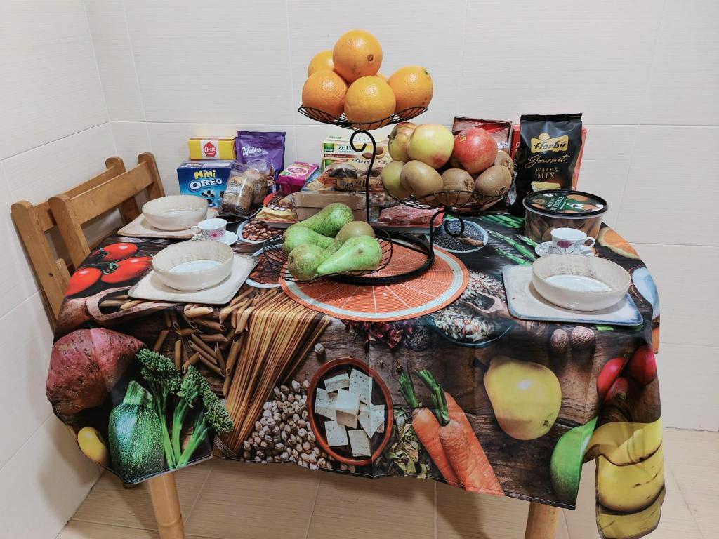 a table with fruits and vegetables on top of it at VIVIENDA de uso TURISTICO in Bóveda