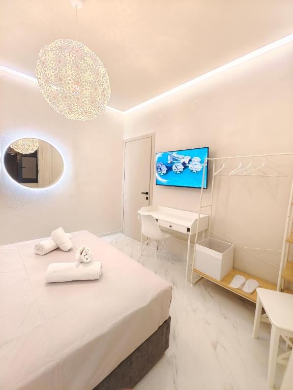 TV a/nebo společenská místnost v ubytování Volos Guesthouse Chrysa