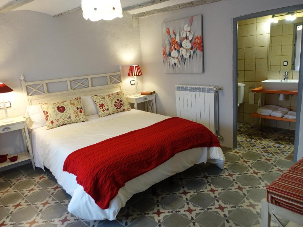 Un pat sau paturi într-o cameră la Apartamentos La Dama Azul