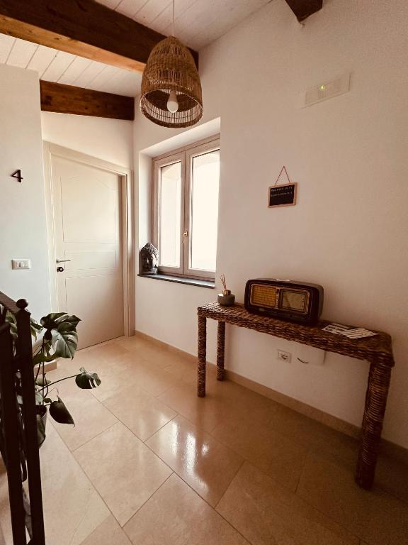 TV a/nebo společenská místnost v ubytování A casa di Alberta B&B Relais