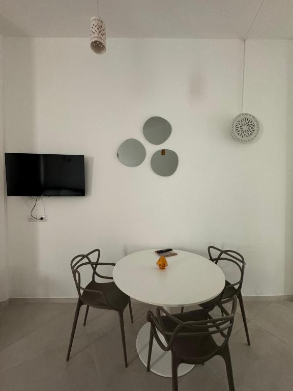 TV a/nebo společenská místnost v ubytování Zefiro Suites