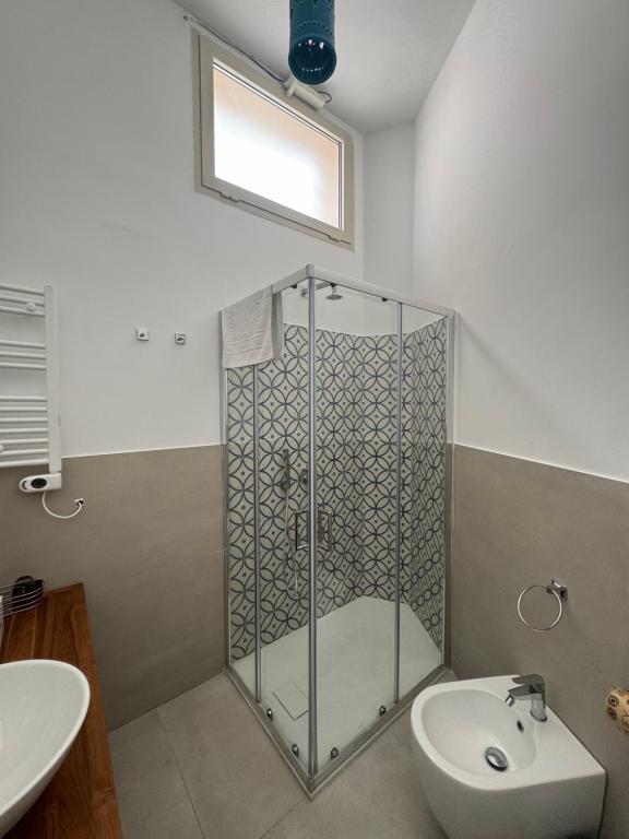 Koupelna v ubytování Zefiro Suites