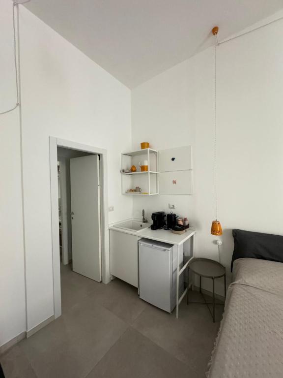 Kuchyň nebo kuchyňský kout v ubytování Zefiro Suites