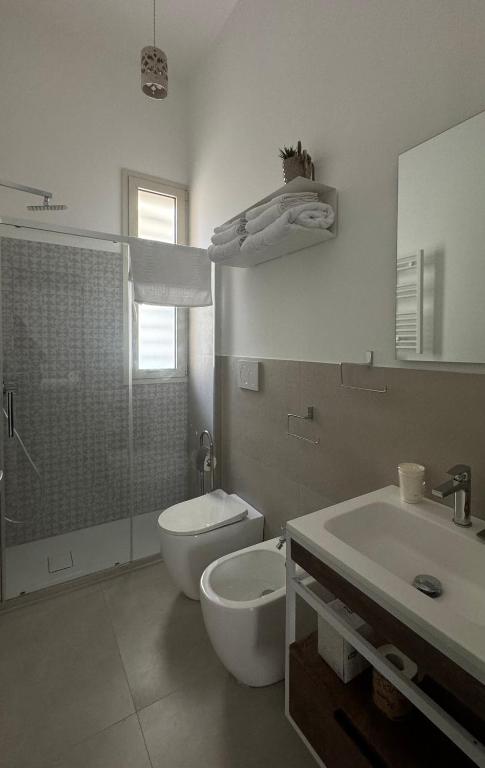 Koupelna v ubytování Zefiro Suites