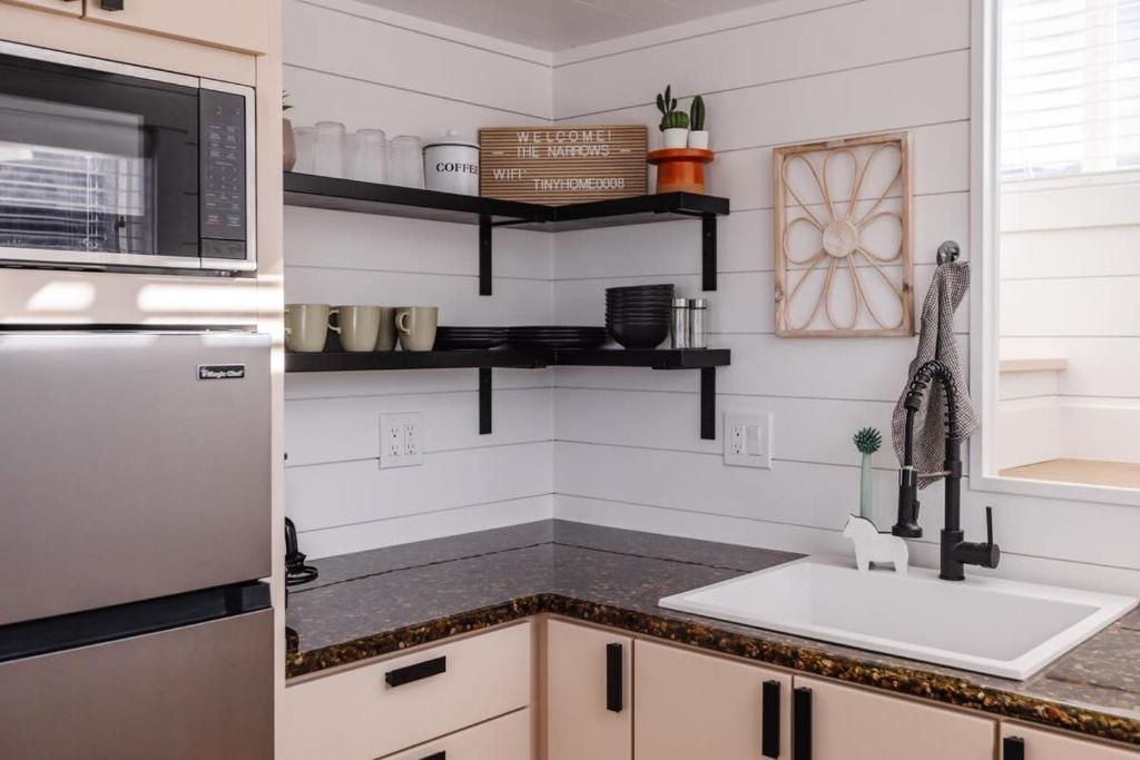 A kitchen or kitchenette at The Narrows Tiny Home