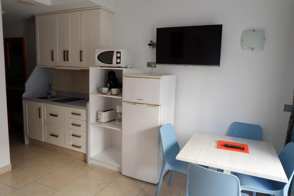Kuchyňa alebo kuchynka v ubytovaní Apartamentos Caracas
