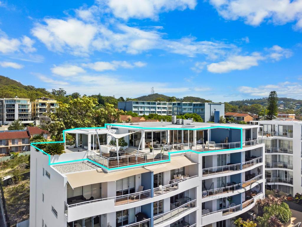 an image of an apartment building with a swimming pool at Waterview Penthouse - Cote D'Azur Resort, Nelson Bay in Nelson Bay